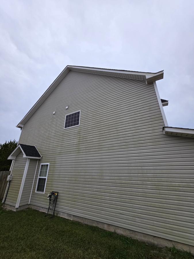 Two-story house before soft wash