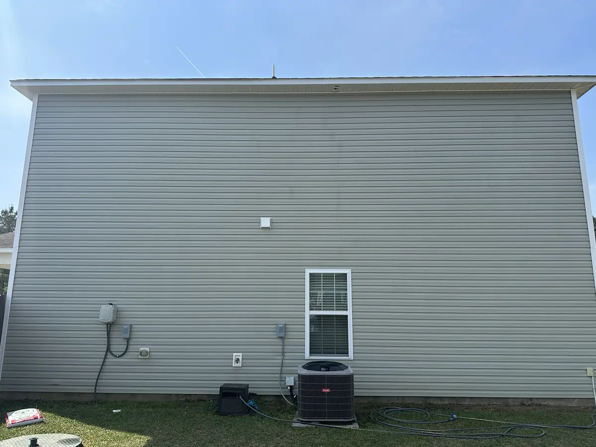 After: gray vinyl home fully cleaned with soft wash by Fresh Start Surface Solutions, Onslow County NC