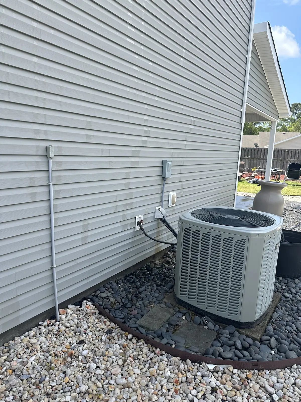 After: metal commercial building exterior cleaned and rust staining removed