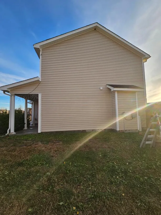 After: house siding fully cleaned and restored